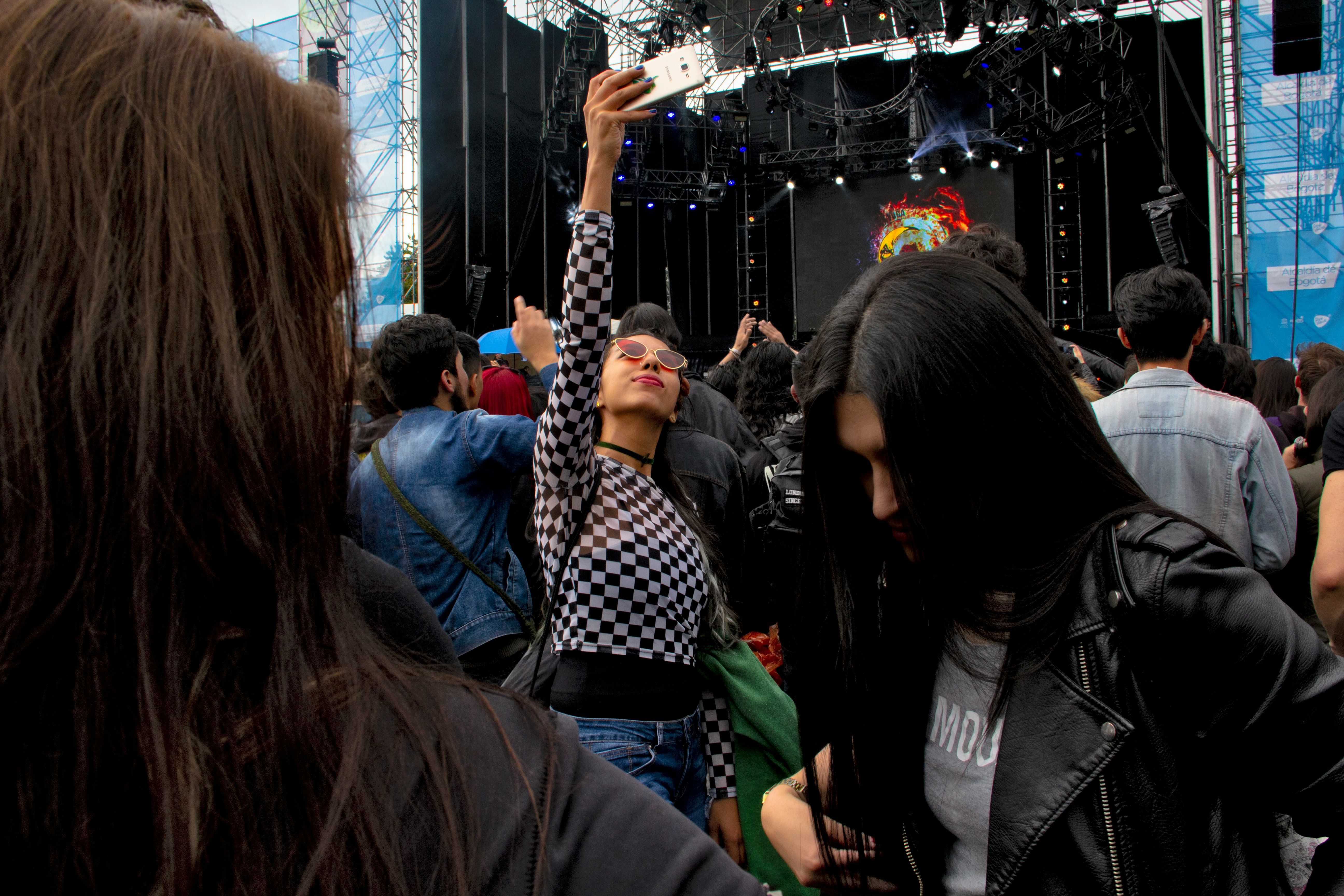 people standing near stage